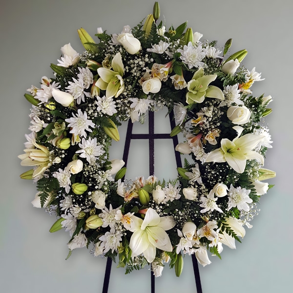 Corona Esperanza de flores blancas y verdes‑FioriNet